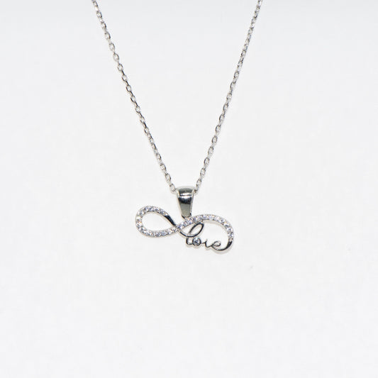 Elegante Halskette mit Anhänger 925 Silber im Symbol Unendlichkeit Design. Rhodiniert und mit funkelnden Zirkonia-Steinen verziert.